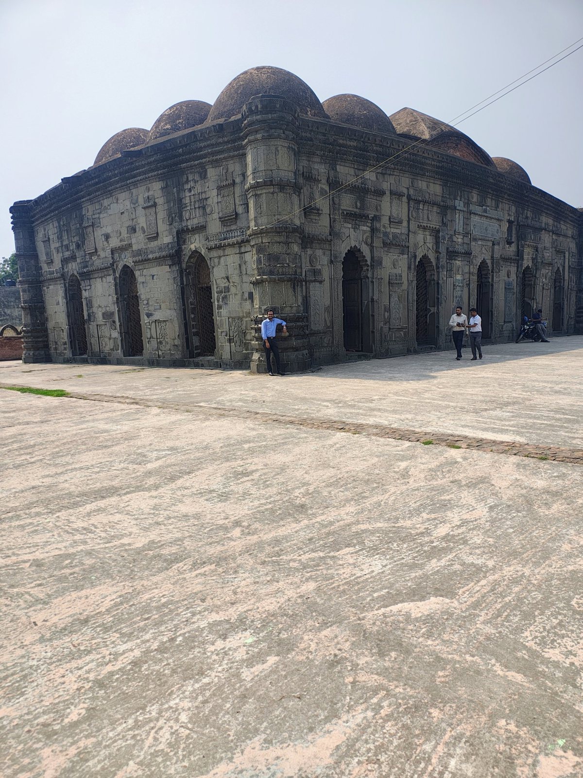 Wide view of the multi-domed historic Chhoto Sona Masjid in Chapainawabganj, Bangladesh